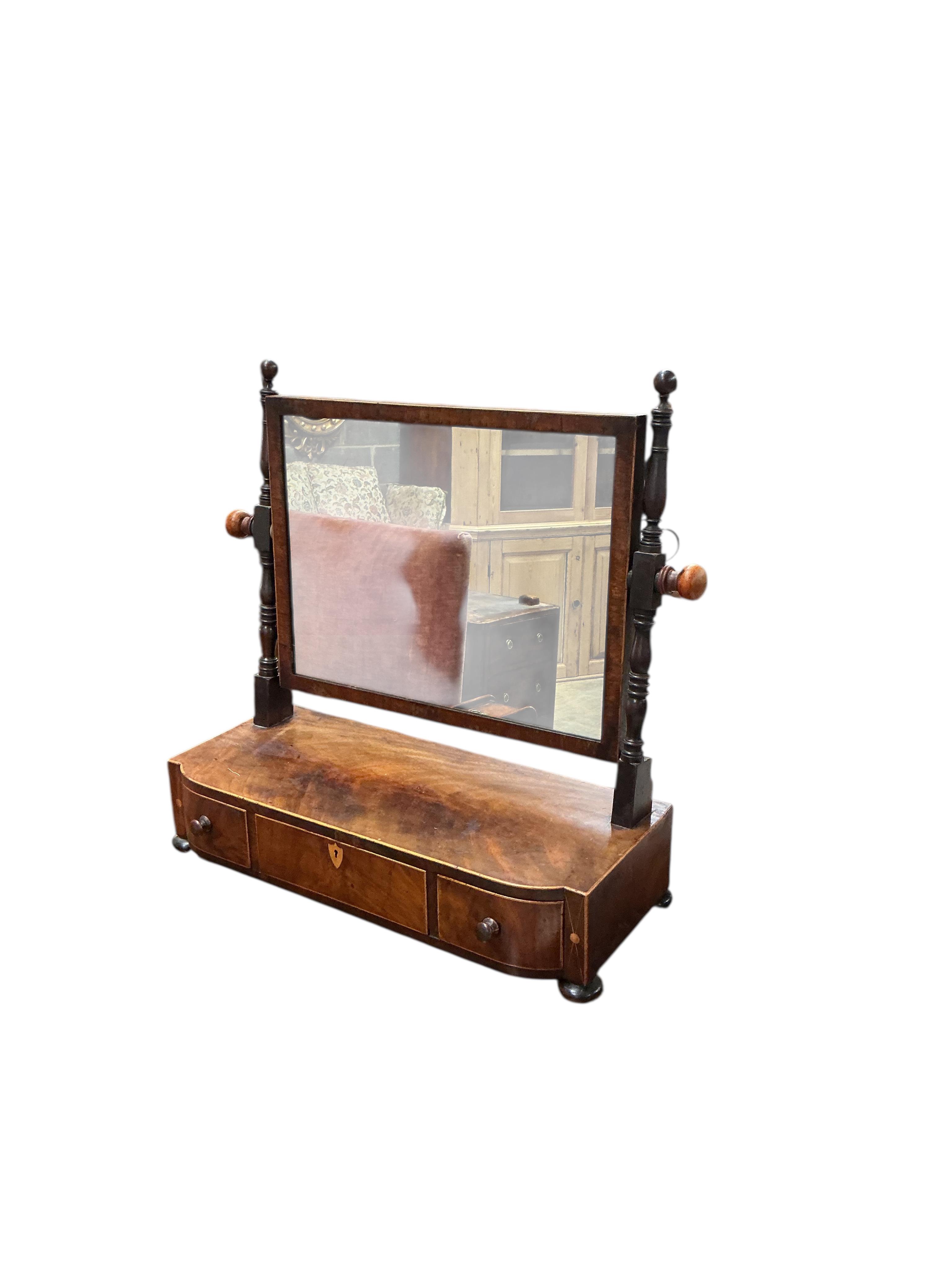 A Regency mahogany bowfront box base toilet mirror, width 52cm, depth 21cm, height 54cm